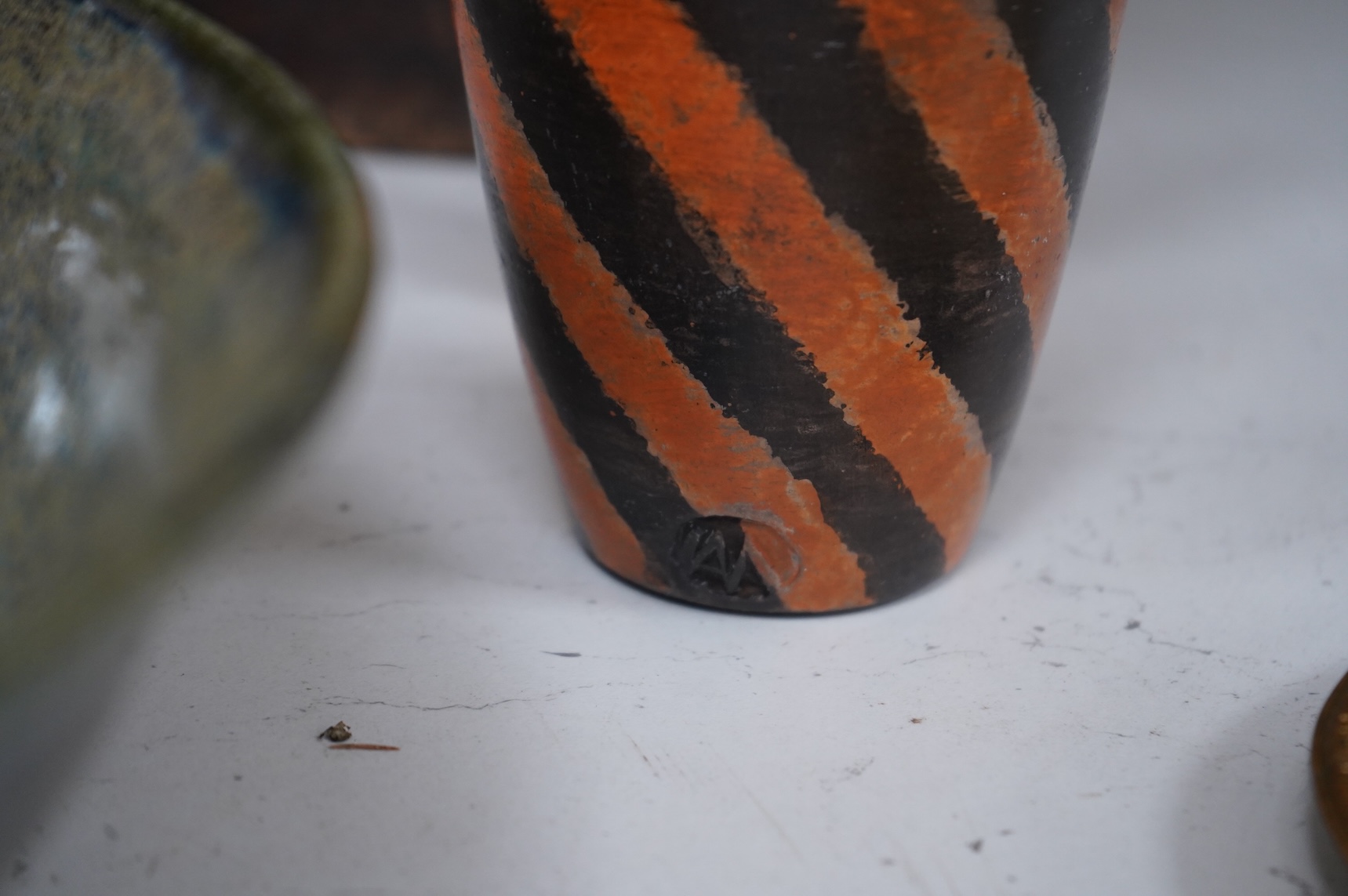 A collection of ceramics to include a Poole turquoise vase, modernist elephant and Santo Stefano di Camastra vase, largest 37cm high